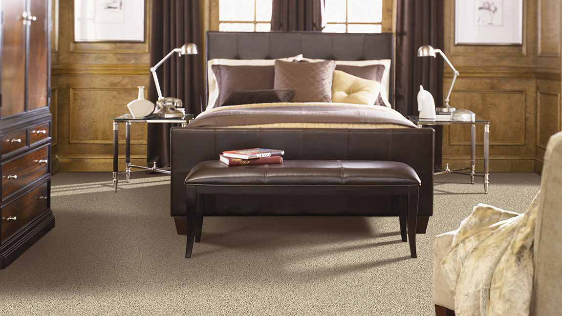 Carpet flooring in a bedroom, installation services available.